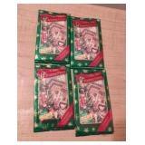Christmas trading cards. Unopened. 4 sets