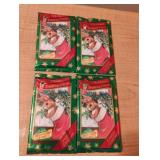 Christmas trading cards. Unopened. 4 sets