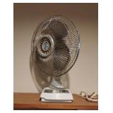 Tatling oscillating desk fan. Works 12"