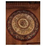 45" diameter  rug, was in front of fireplace