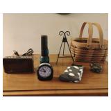 Alarm clocks, flashlight, basket and more.....