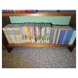 Various Books on Bottom Shelf