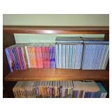 Various Books on Top Shelf