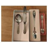 Baby silver plated spoons and a knife