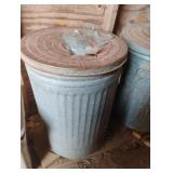 Galvanized trash can with horse pellets and