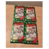 Christmas trading cards. Unopened 4 sets