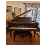 Baldwin grand piano 56W x  37H x 64D