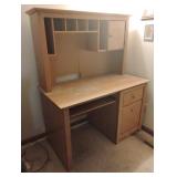 Wood desk. Includes contents 47 x 58.5 x 25.5