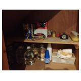 Candles, flash light, glass jugs of water and