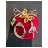 4 brooches in strawberry pin cushion