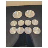 vintage aluminum coasters featuring an embossed