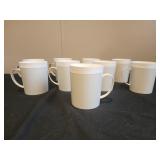 Gray and white plastic coffee mug set
