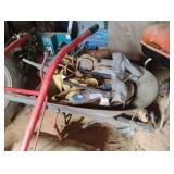 Wheelbarrow with flat tire and contents