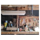 Pegboard and table contents not including bench