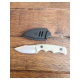 Ozark trail fixed blade 3"  serrated knife with Ozark trail fixed blade 3"  serrated knife with