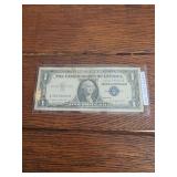 1957 A silver certificate dollar bill 1957 A silver certificate dollar bill