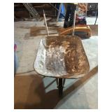 Vintage Cement Wheelbarrow (is low to the ground)