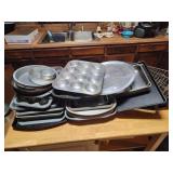 Large lot of baking pans, muffin pans, pizza