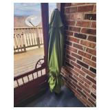 Green outdoor patio umbrella