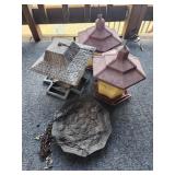 3 plastic bird feeders and flat plaster hanging