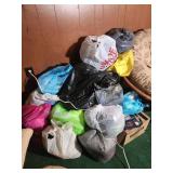 Bags of clothes, kids adults, some shoes mostly