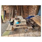 Picnic table, planters, stones, pool ladder