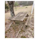 Weathered picnic table one sided seating