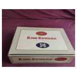 Vintage postmarked stamps in a King Edward cougar