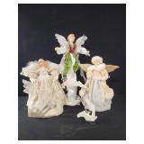Two 12" angel Christmas tree toppers. 18" table