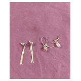 Gold colored dangle earrings