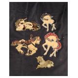 Unicorn sun catchers and a gold gold colored