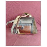 Colorful faux leather and suede pocketbook
