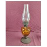 Vintage amber colored oil lamp