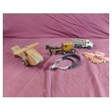 Metal truck, plastic teeth, wood plane and