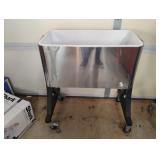 Stainless steel cooler cart on wheels. No lid