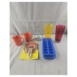 Vase, orange mugs, plastic cups, ice trays and