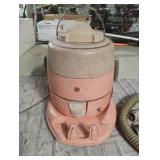 Vintage GE canister vacuum with accessories.