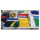 12 assorted flags,Uruguay flag, Haiti. Canada,