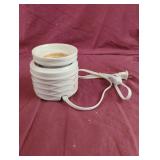 Electronic wax warmer. Powers on