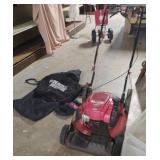 Troy-Bilt TB230 push mower. Has compression.with