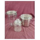 Glass and metal canisters