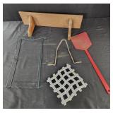 Wooden shelf, trivet, fly swatter, metal holders