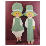 Hand painted wood girl and boy. Up to 28.5"