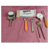 Adjustable pliers, screwdriver and more......