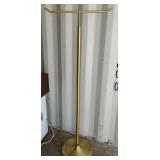 Brass colored metal coat hanger 64" tall