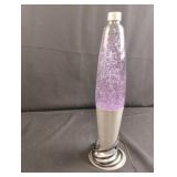Glitter lamp. Missing top. Works