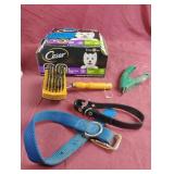 Cesar dog food, collars, brush and nail clippers