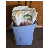 Holly-Tone Plant Food in Trash Can