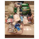Bandages, shower body puffs. Medical tape and