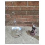 Plastic bird feeder and a water hose nozzle